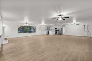 Front room, great room, all new floors, new kitchen, new paint, new textured ceiling, all done with contractors