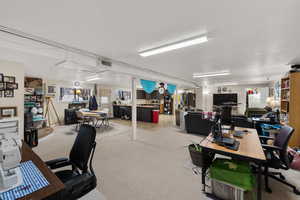 Office area with a textured ceiling