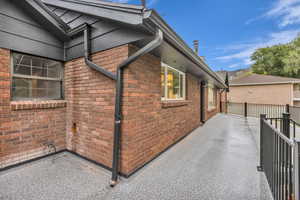 View of home's exterior with brick siding