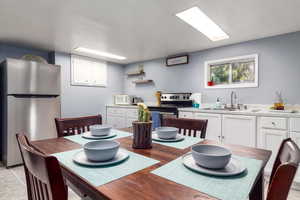 Dining space featuring light wood-style floors