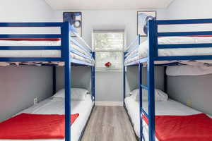 Bedroom with wood finished floors