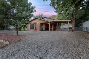 View of front of house featuring stucco siding