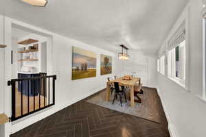 Large dining space with a cute chandelier