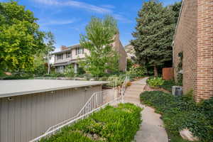 View of yard featuring stairway
