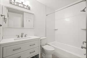 Full bathroom with vanity and  shower combination