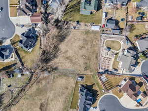 Aerial view of property's location with nearby suburban area