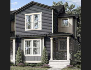 Property entrance with stone siding