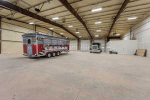 Garage featuring metal wall