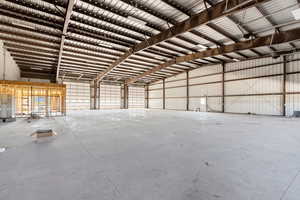 Garage featuring metal wall