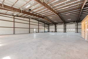Garage featuring metal wall