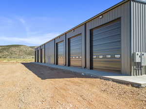 Garage featuring a mountain view