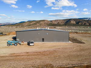 View of pole building featuring a mountain view