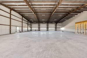 Garage featuring metal wall