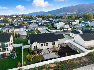 Aerial perspective of suburban area featuring mountains