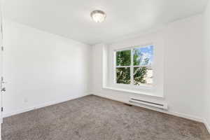 Empty bedroom  and carpet floors,  window seat
