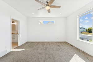 Primary Suite with ceiling fan, and recessed lighting