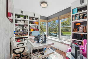 Office area featuring wood finished floors