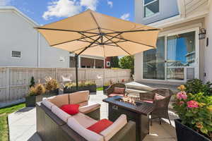 View of patio / terrace featuring an outdoor living space with a fire pit