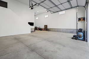 Garage featuring a garage door opener