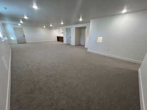 Finished basement featuring carpet and recessed lighting