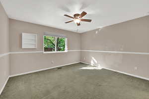 Primary bedroom with a view of the yard