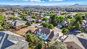 Aerial view of residential area with a mountain backdrop