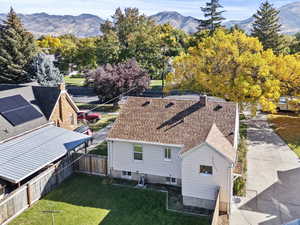 View from above of property with a mountain backdrop
