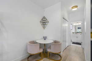 Dining room with light wood-style floors