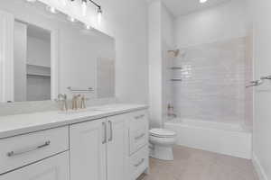 Full bathroom with vanity and washtub / shower combination