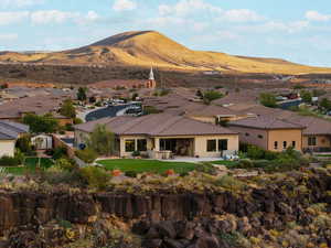 View of mountain background featuring nearby suburban area