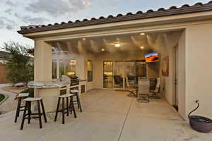 View of patio with area for grilling