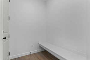 Mudroom with baseboards and light wood-style floors