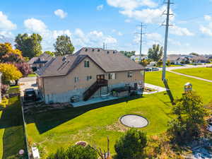Back of property with a patio area