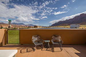 Patio / terrace with a mountain view