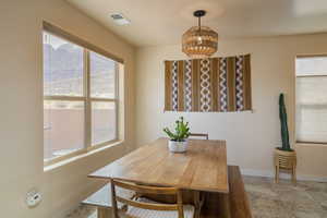 Dining area with healthy amount of natural light