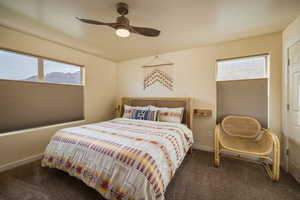 Bedroom featuring carpet flooring and a ceiling fan