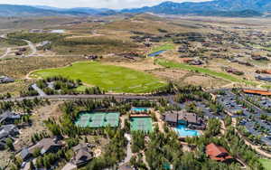 Aerial view of mountains and a golf club