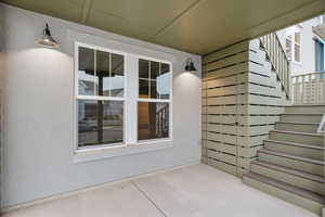 View of patio with stairs