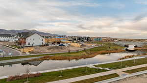Aerial view of residential area with a water and mountain view