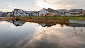 Water view featuring nearby suburban area