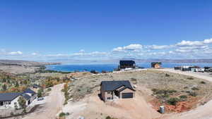 View of subject property featuring a large body of water