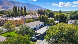 Aerial perspective of suburban area with a mountain backdrop