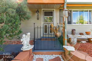 Entrance to property with covered porch