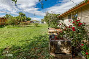 View of yard with a vegetable garden