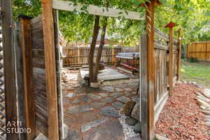 View of fenced backyard