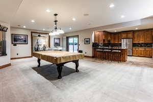 Playroom with light colored carpet, billiards, recessed lighting, and a ceiling fan