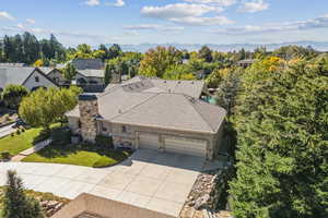 Bird's eye view of mountains and a tree filled landscape