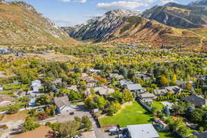 Aerial view of residential area featuring a mountainous background