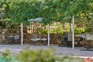View of patio featuring outdoor dining area