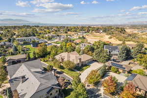Aerial view of residential area featuring a mountain backdrop